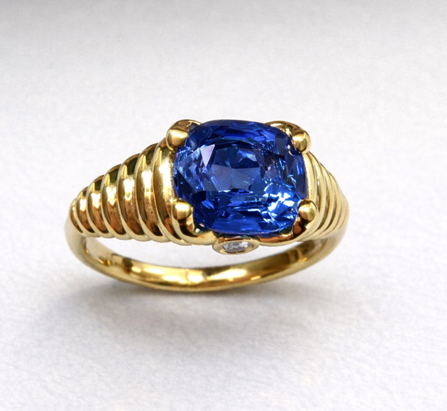 Elegant Wave Design Blue Sapphire and Diamond Ring