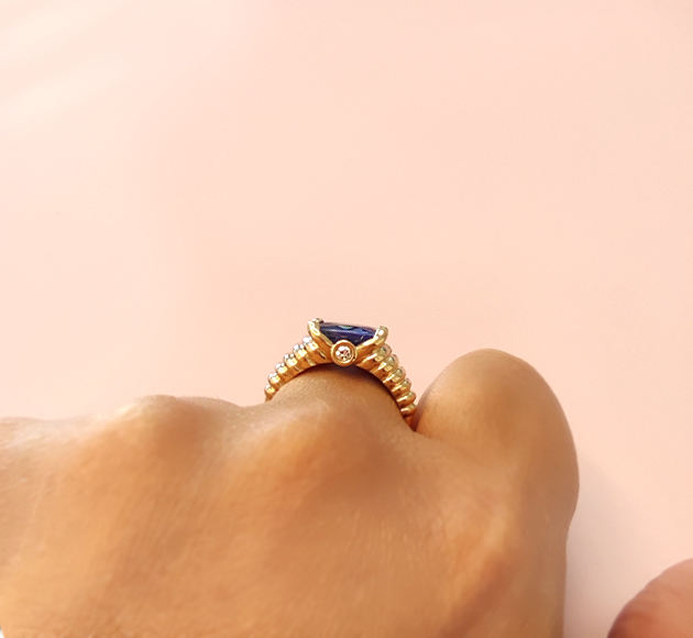 Elegant Wave Design Blue Sapphire and Diamond Ring